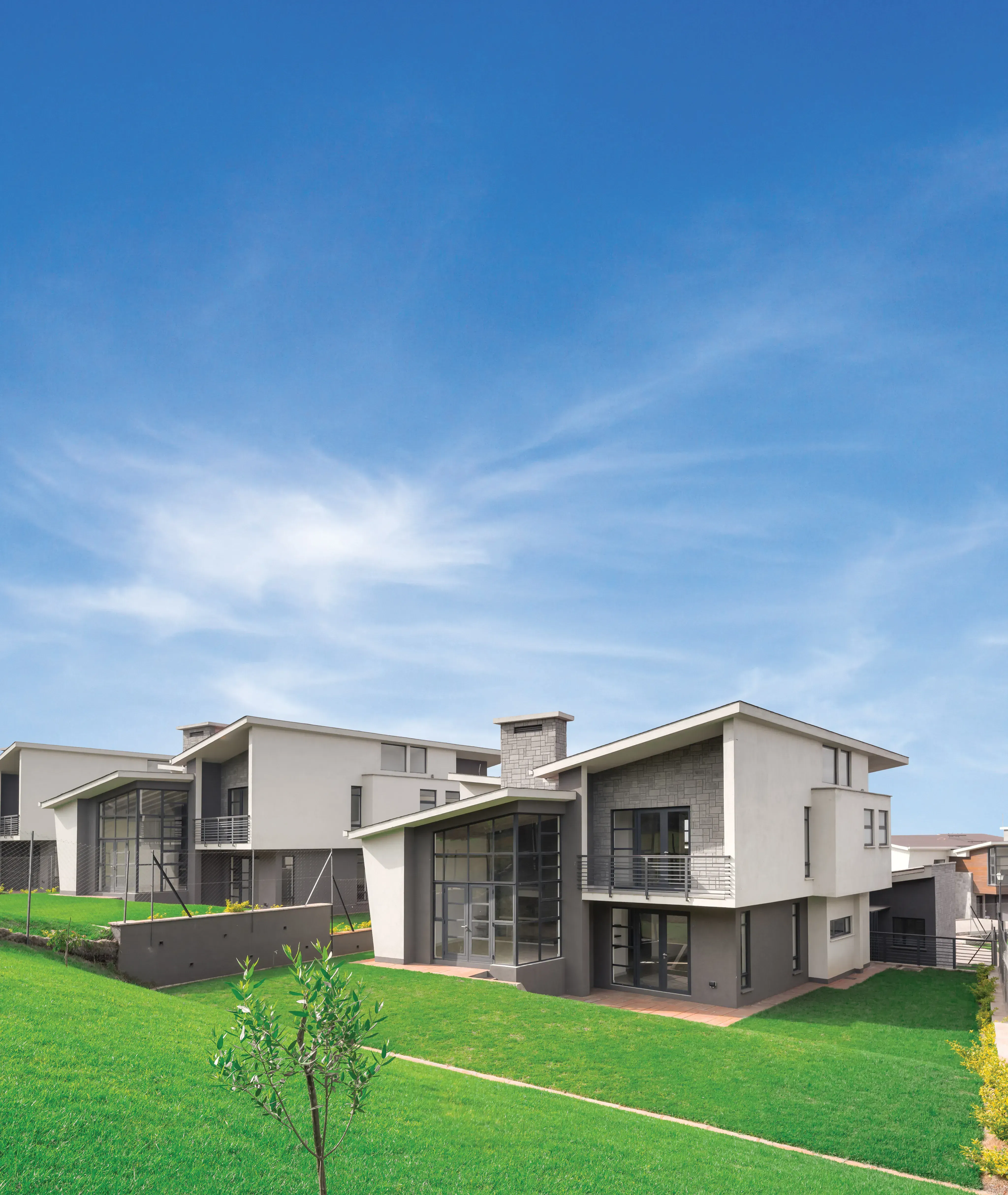 Balcony with shaded lawn view in 4br townhouse at Tilisi Views Limuru Town Kenya